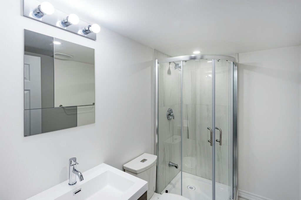 basement small bathroom renovation with vanity and countertop