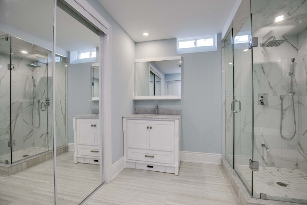mirror sliding door with single white vanity and countertop