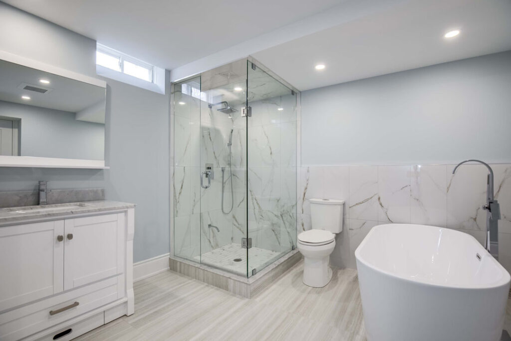 corner shower unit with free standing bathtub