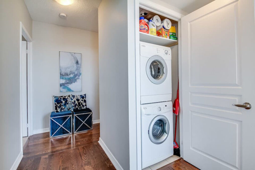 small laundry space renovation with storage cabinet