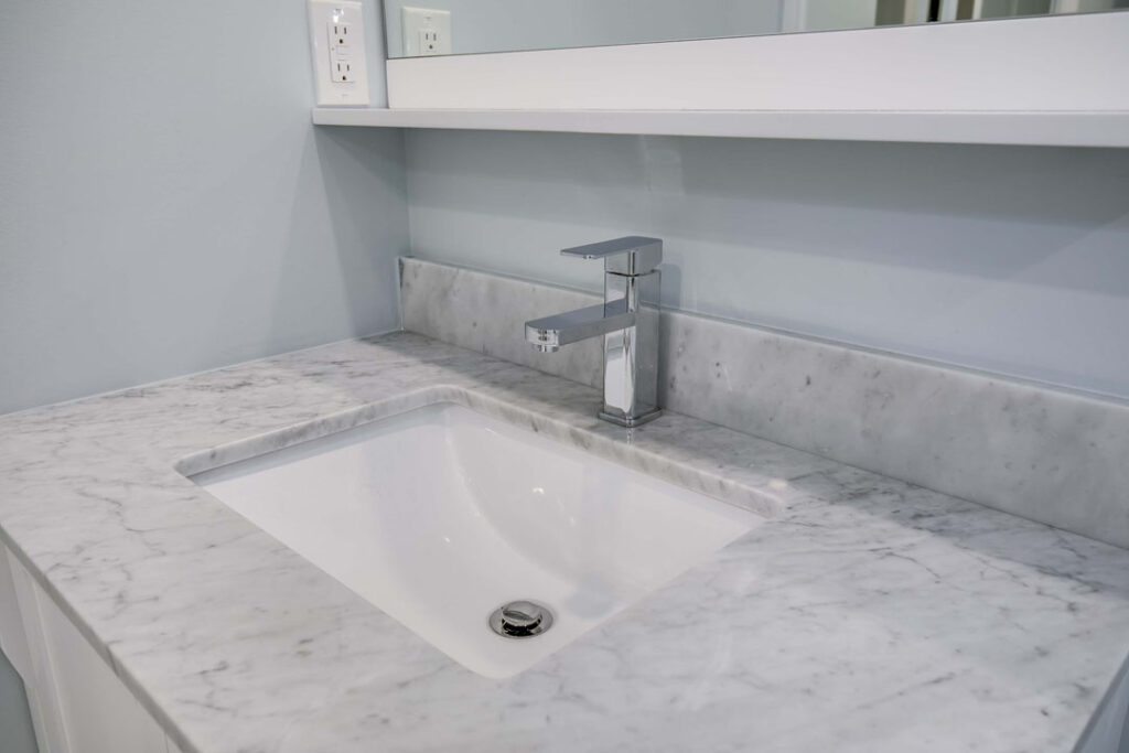 marble countertop with basin sink and water tap renovation